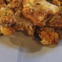 Fried Cauliflower · Vegan, gluten free. Cauliflower fried, seasoned with lemon juice and fresh minced garlic.