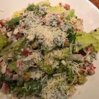 Italian Chopped Salad · Chopped romaine, radicchio, string beans, Italian ham, salami, fontina cheese, chopped hard-...