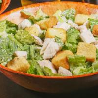 Chicken Caesar Salad · Romaine lettuce hand tossed tossed in our hand crafted caesar dressing topped with juicy chi...