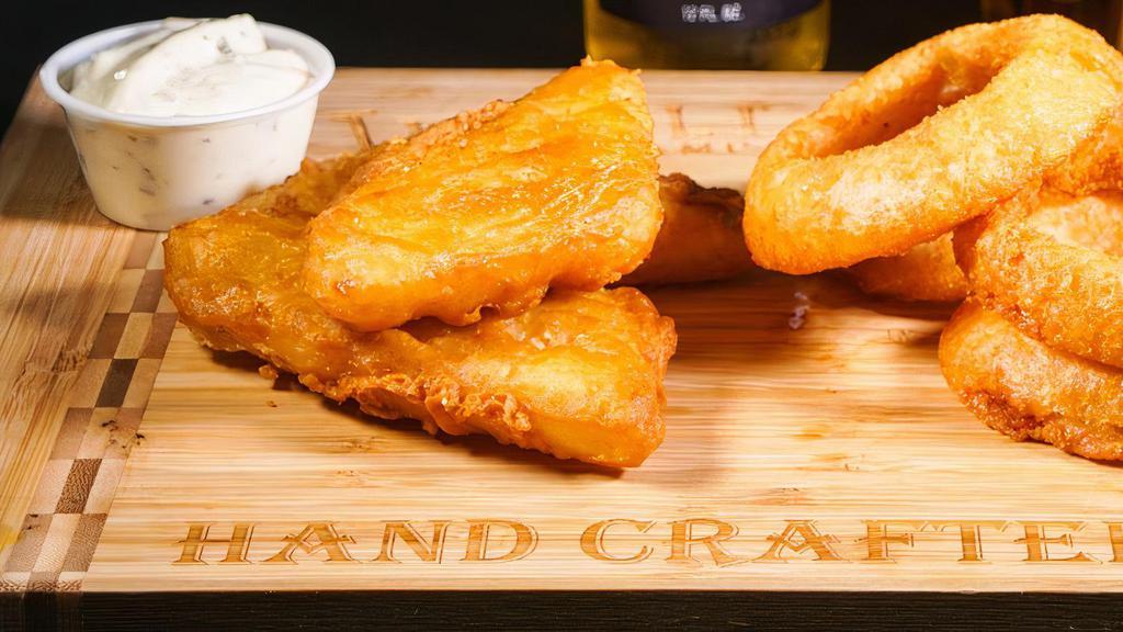 Fish & Rings · 3 pieces of Beer Battered Alaskan Cod served with a choice of side