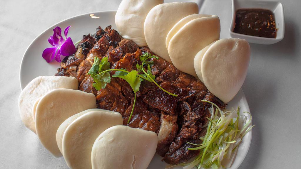 1/2 Peking Duck · Boneless slices, roasted and served with steamed buns, scallions and Hoisin sauce