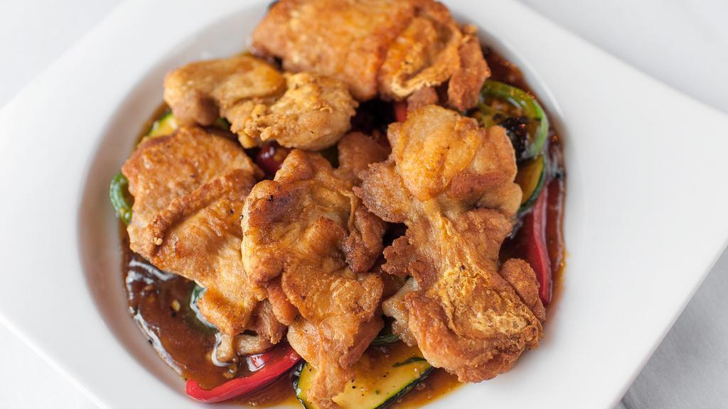 Chicken Wingo · Grilled boneless chicken wings with zucchini and peppers in black bean sauce – Wing Fat’s favorite.