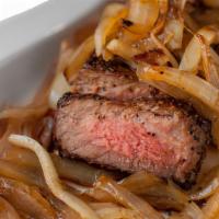 Frank'S Style Ny Steak · 16-ounce NY steak smothered in sautéed onions and oyster sauce. A Frank Fat specialty.