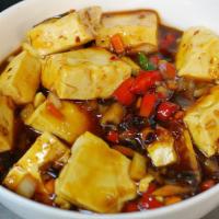 Ma Po Tofu · With silken tofu in a spicy Szechuan sauce