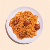 Spaghetti And Meatballs · Four meatballs over spaghetti with Ma's Sunday Sauce.