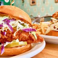 Crispy Chicken Sandwich · Seasoned fried chicken breast, coleslaw, pickles, jalapeño, and our homemade chipotle sauce ...