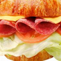 Salami & Cheese Croissant Sandwich · Includes cheese (your choice), lettuce, tomato, and mayonnaise. Dill pickle spear, pepperonc...