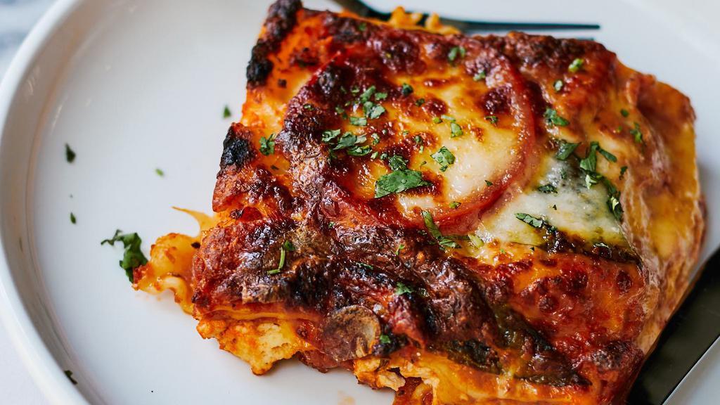 Lasagna · Tomato, basil, three cheeses.