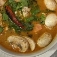 Tom Yum Gai / Hot & Sour Chicken Soup · Chicken lemongrass soup with fresh mushrooms, onions, and lime juice.