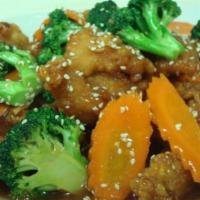 Orange Chicken · Sauteed battered crispy chicken with tangerine sauce, served on steamed broccoli and sprinkl...
