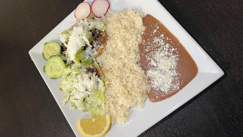Sopes Combo · 2 Handmade corn shell with beans, lettuce, cheese and choice of meat rice and beans