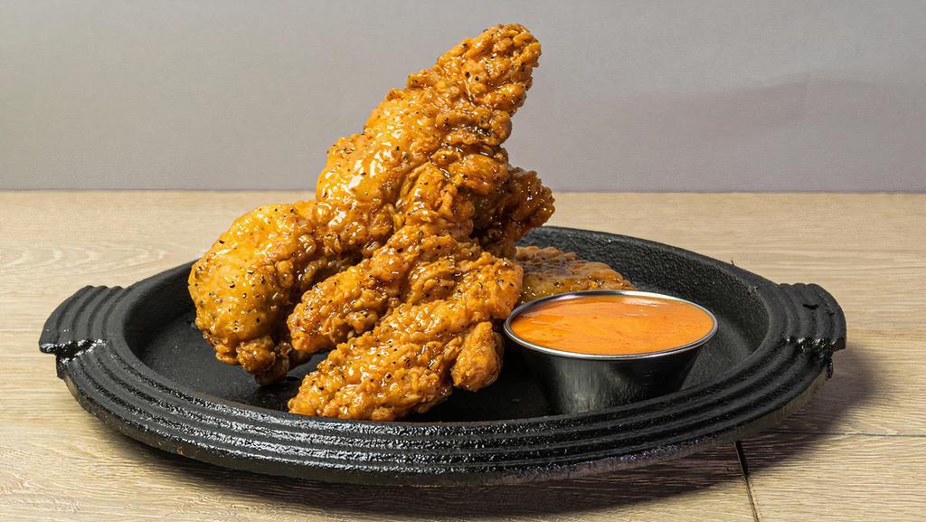 Truffle Tenders · 3 crispy chicken tenders tossed with your choice of truffle sauce