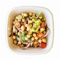 Side Of Mediterranean Chickpeas · Comes with Red Onions, Cherry Tomatoes, Cucumbers, Cilantro, and Lemon.