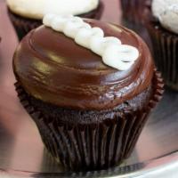 Chocolate Cream · Chocolate cupcake filled with cream and topped with fudge frosting.