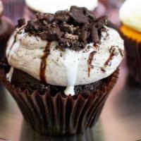 Cookies N' Cream · Chocolate cupcake with Oreo cookie frosting topped with oreo cookie crumbles.