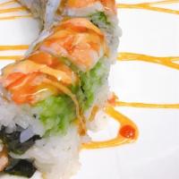Tiger Roll · Spicy. Deep-fried shrimp, avocado, crab topped with cooked shrimp and sweet and spicy sauce.