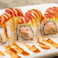 Carmichael · Spicy. Deep-fried shrimp, crab, topped with tuna, avocado, spicy sauce.