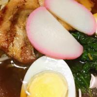 Shoyu Ramen · Soy sauce base noodle soup, BBQ pork, boiled egg, bean sprouts, seaweed, fish cake.