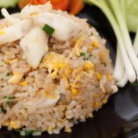 Crab Fried Rice · Pan fried rice with egg, onion, carrots & peas.