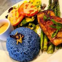 Salmon Fomo · Grilled Salmon fillet served with salad & grilled asparagus and Anchan Blue Rice