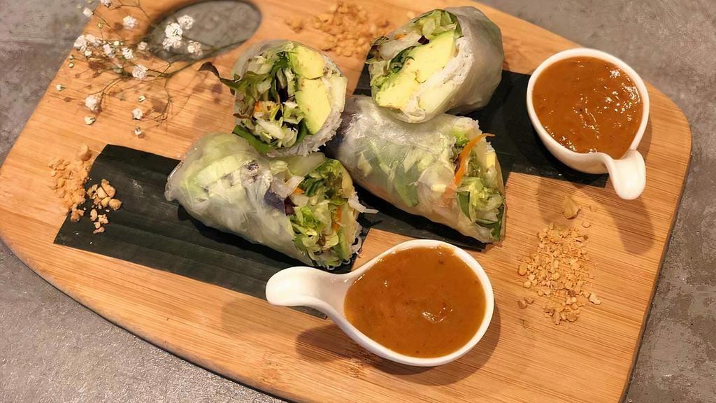 Avocado Fresh Roll · Avocado, mix greens, rice vermicelli noodles, cucumber, carrots wrapped with rice wrapper served with peanut sauce.