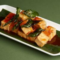 Golden Tofu · Deep-fried tofu in sweet and sour tamarind sauce, and topped with deep-fried basil.