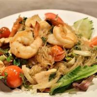 Yum Woonsen Salad · Spicy. Glass noodles with shrimp, chicken, and vegetables with spicy lime dressing.