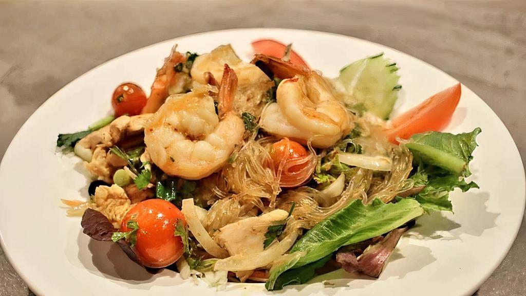 Yum Woonsen Salad · Spicy. Glass noodles with shrimp, chicken, and vegetables with spicy lime dressing.
