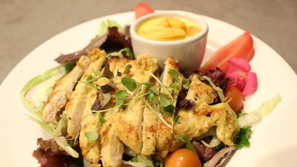 Manaao Salad · Chicken OR Tofu tossed with mix greens, onion, tomato, cucumber, carrot, and house dressing.