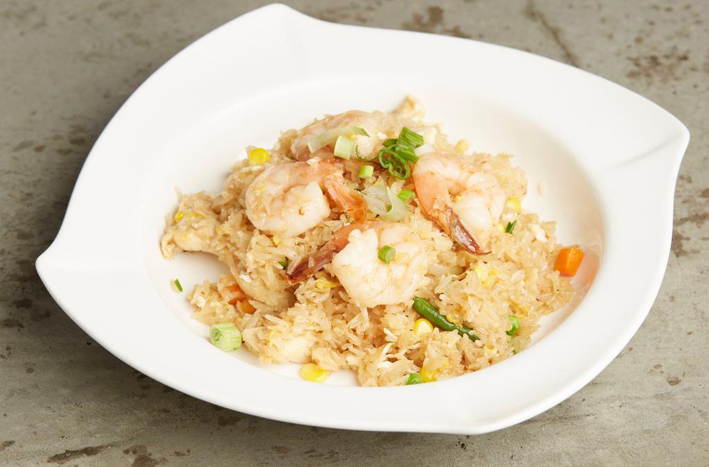 Sticky Fried Rice Chicken & Shrimp · Stir-fried sticky rice with chicken and shrimp, eggs, garlic, onion, tomato, and carrots and peas.