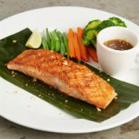 Thai Bbq Salmon · Spicy. Grilled marinated salmon served on a bed of assorted vegetables with spicy lime and t...