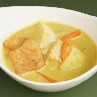 Yellow Curry · Sweet yam, carrot and yellow curry powder in coconut milk.