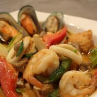 Pad Tom Yum Talay · The most popular and signature dish for our restaurant. Stir-fried seafood in creamy tom yum...