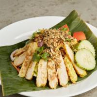 Larb Gai Samunprai · Medium spicy. Chopped grilled chicken, onion, roasted rice powder and dressed with lime juic...