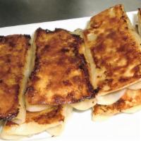 Pan Fried Pork Dumplings (8) · 鲜肉锅贴
