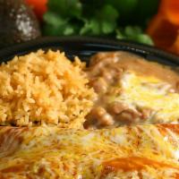 Two Enchiladas · Two corn tortillas rolled and stuffed with your choice of shredded beef, chicken or cheese s...