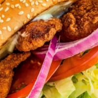 Crispy Chicken Sandwich  · Sesame Bun, Mayonnaise, Lettuce, Tomato & Red Onions