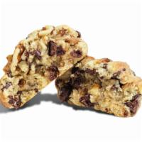 Walnut Chocolate Chip  · THE REMIX. SEMI-SWEET GOURMET CHOCOLATE CHIPS AND WALNUTS.
Each cookie weighs 3 oz and is no...