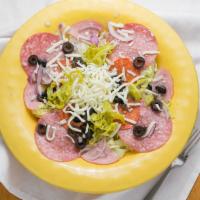 Antipasto Salad · Lettuce, Italian salami, smoked Canadian bacon, pepperoni, shredded Mozzarella cheese, slice...