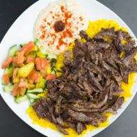 Beef Shawarma · Rice, hummus, salad, tahini.