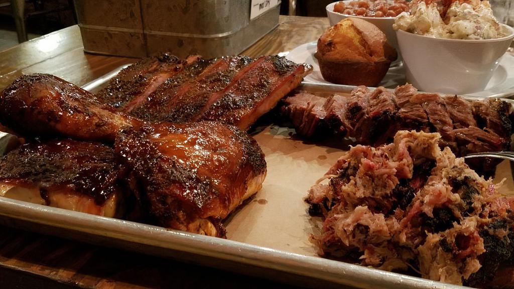 Weaknees Plate **No Substitutions Please** · 1/2 RACK ST LOUIS RIBS 
+ 
 1/4 BBQ CHICKEN
+
1/4 lb. PULLED PORK
+
 1/4 LB BRISKET 

INCLUDES::
(2) HALF PINTS TRADITIONAL SIDES 
(2) PIECES CORNBREAD 

*UPGRADE TO PREMIUM SIDES FOR $3/EACH*