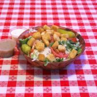 Tossed Salad With Cheese · Crispy green leaf and iceberg lettuce, croutons and tomatoes.  Topped with freshly grated mo...