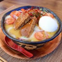 Vegetable Ramen · Creamy vegetable broth with spinach noodles ,Tofu mizuna green, cherry tomato, red and yello...