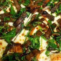 Steak Pizza · Steak, Mushrooms, Red Onions, Arugula, BBQ Sauce, Base Garlic Olive Oil