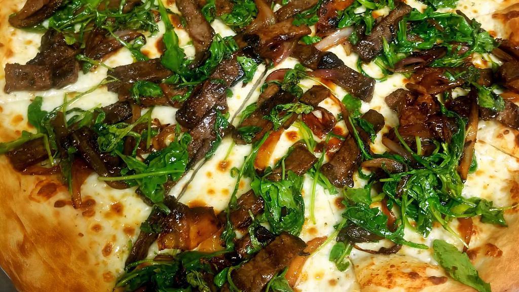 Steak Pizza · Steak, Mushrooms, Red Onions, Arugula, BBQ Sauce, Base Garlic Olive Oil