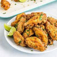 Lemon Pepper Wings · Famous lemon pepper wings with customer's choice of bone-in or boneless! Served with choice ...