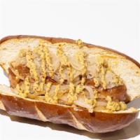 Frankwurst · Bratwurst sausage topped with grilled onions, sauerkraut, and stone ground mustard served on...