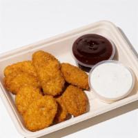 Chicken Nuggets · Nine piece chicken nuggets served with your choice of  sauces. (Vegan)