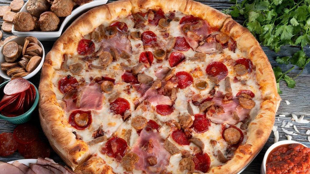 Meat Lovers Pizza* · Red sauce, mozzarella, beef pepperoni, bacon, Italian sausage,  beef meatballs.
