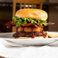Bbq Bacon Burger · Applewood smoked bacon, crispy onion rings, lettuce, tomato, BBQ sauce, mayo